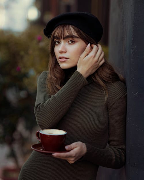 Young Woman with Cup of Coffee
