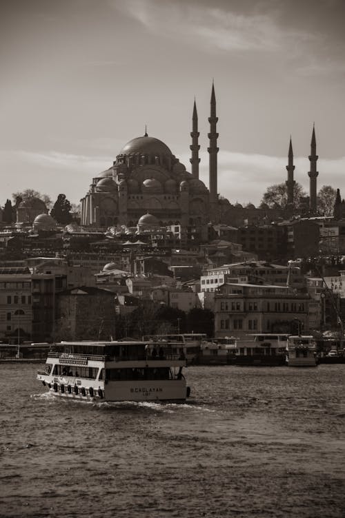 View of a Ferry on the Bosphorus Strait and Cityscape of Istanbul in the Background 