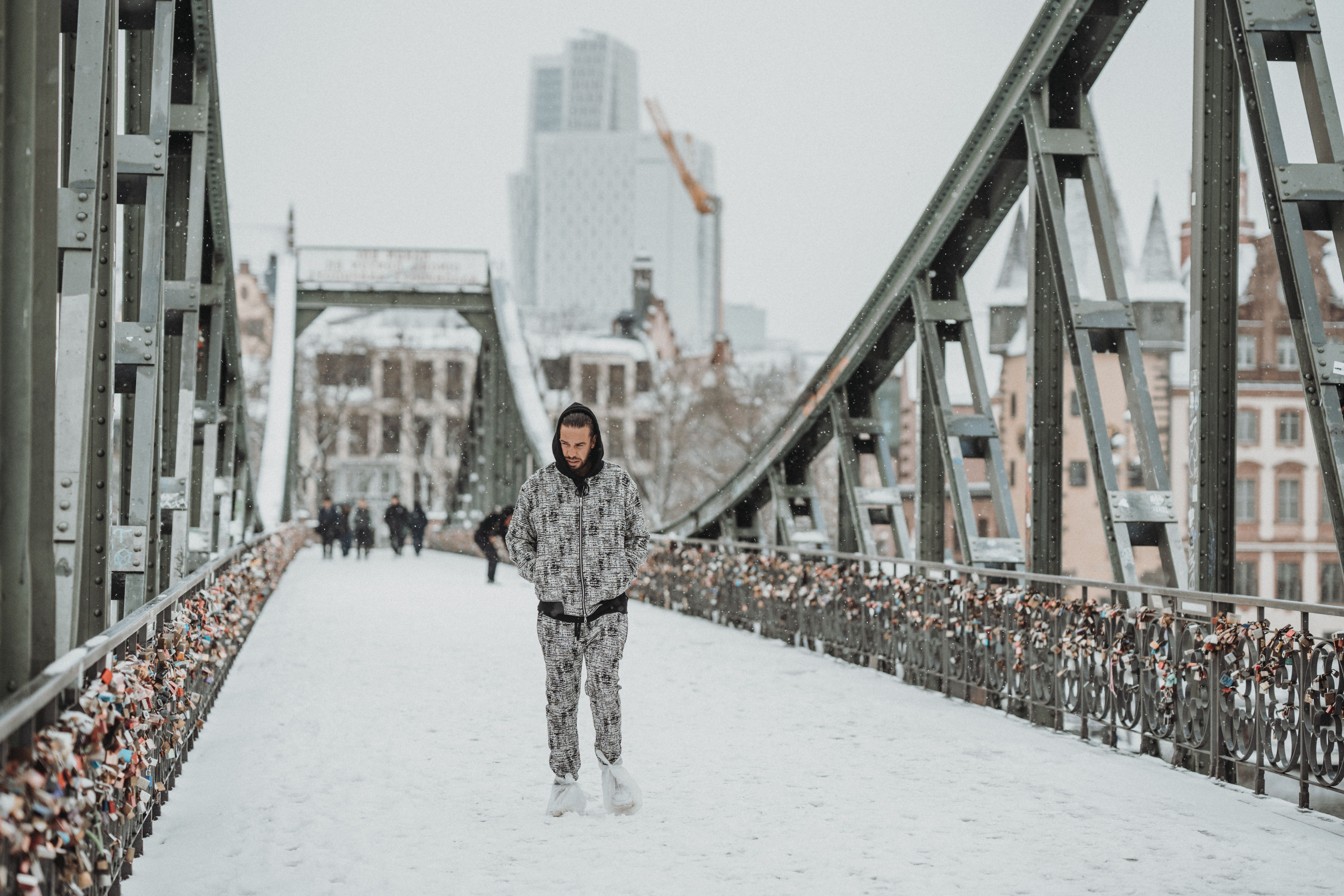 A Man Standing on a Bridge · Free Stock Photo