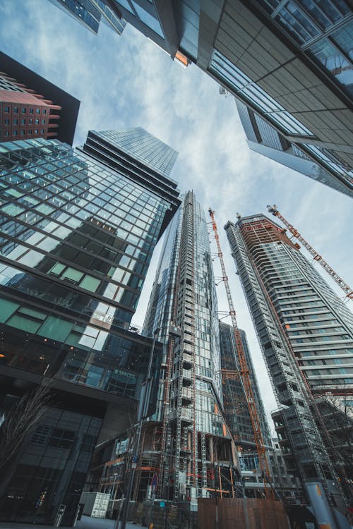 Low Angle Shot of Modern City Buildings and the Sky Above 