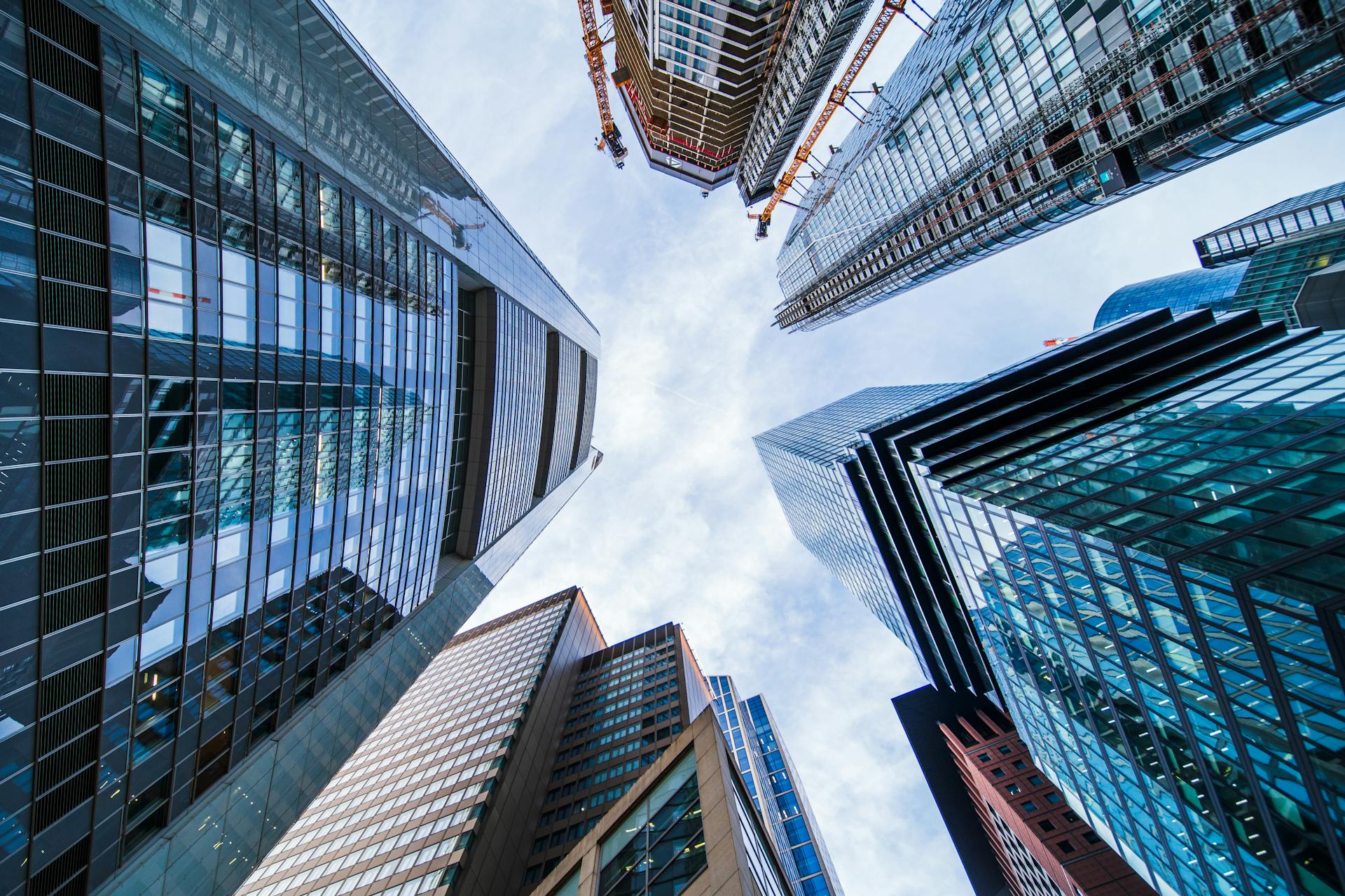 The view from the ground looking up at tall buildings Stock Photo