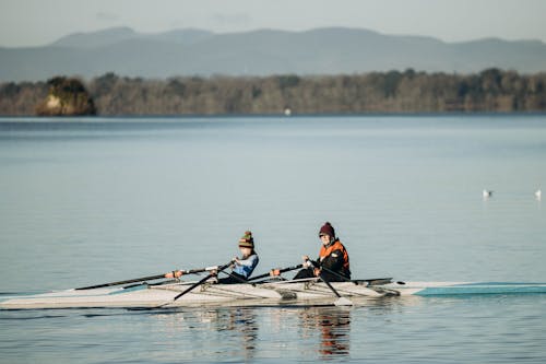 Boy and Man in Rowing Boar
