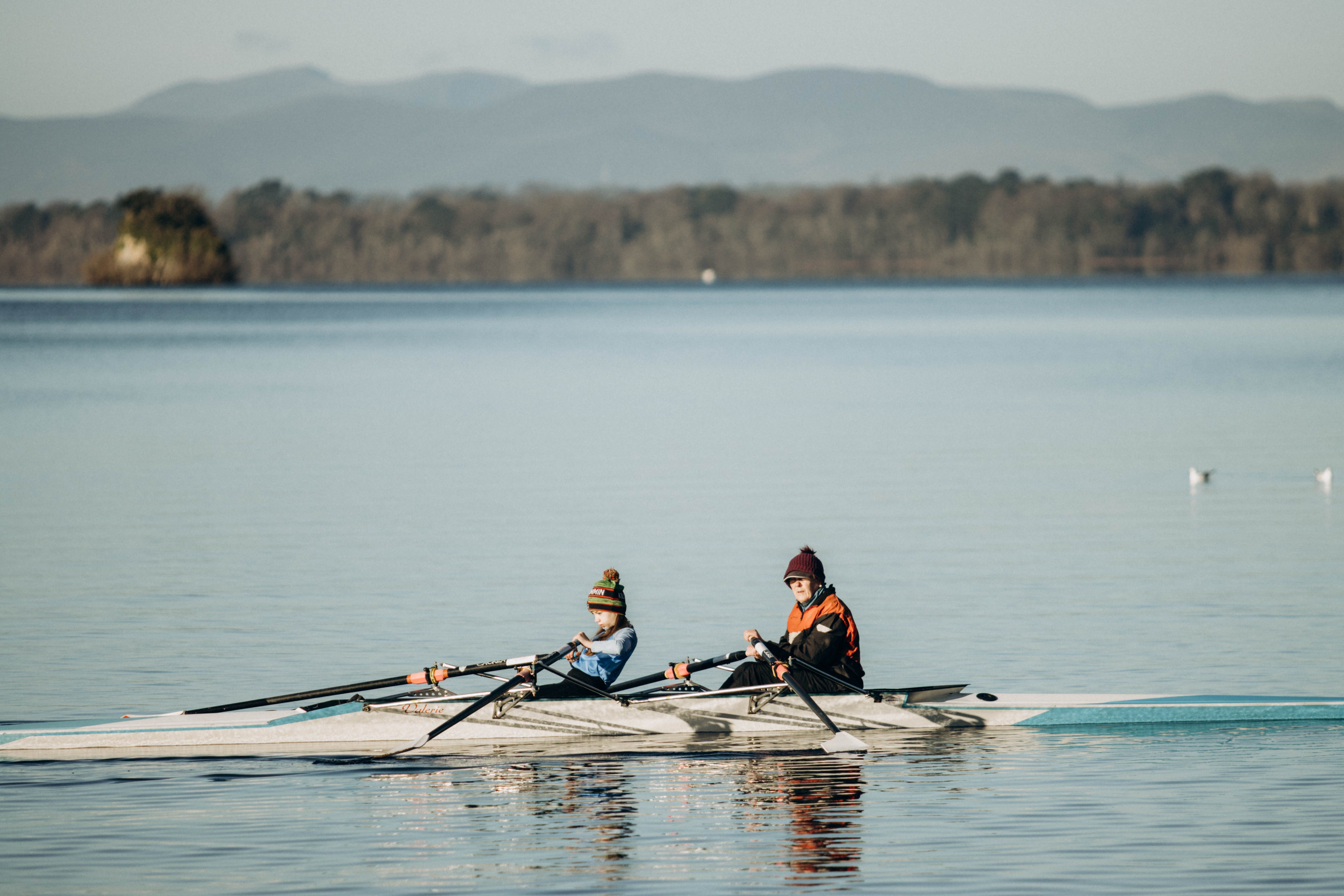 Boy and Man in Rowing Boar · Free Stock Photo