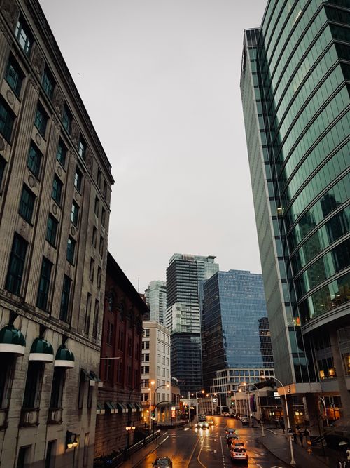 Free Vancouver downtown with skyscrapers and busy streets, showcasing urban architecture. Stock Photo
