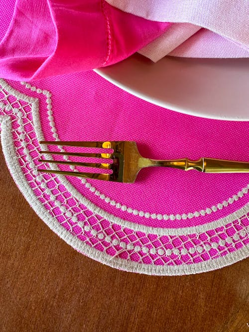 Golden Fork on a Pink Placemat