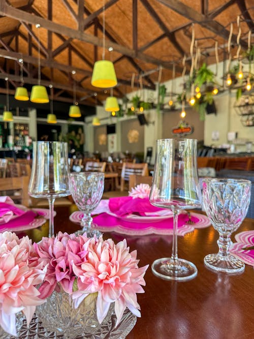 Wine Glasses on a Restaurant Table Decorated with Flowers