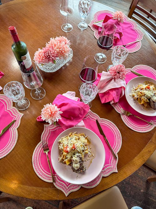 Dinner and Wine Served on a Table 