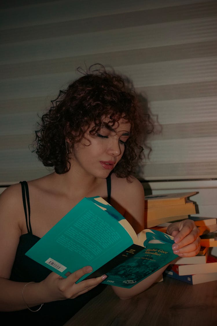 Student Woman Reads Book