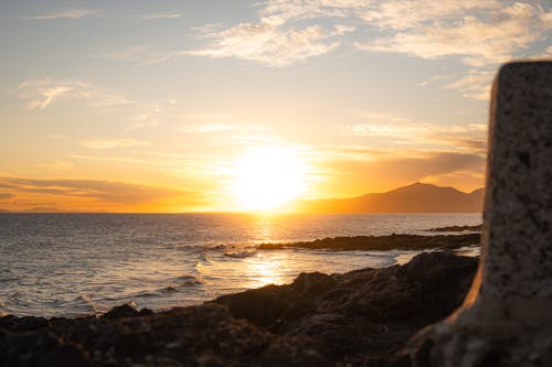 Sun Rising on Yellow over Seascape