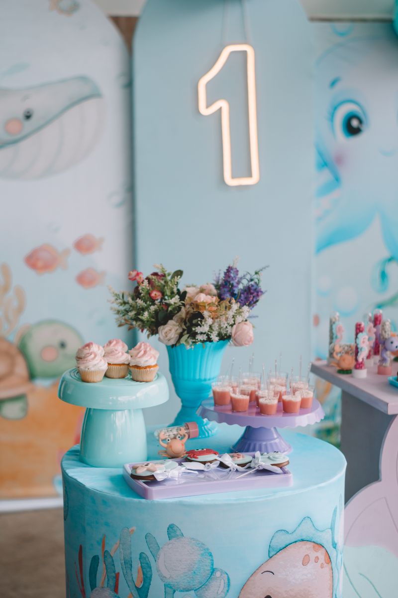 Underwater themed party decorations with blue tones and sea creatures