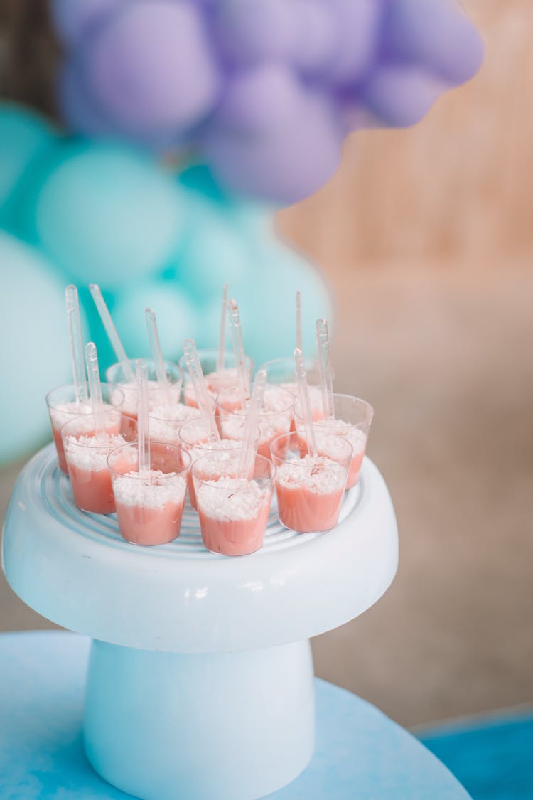 Pink Dessert In Small Plastic Cups