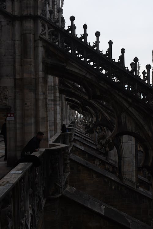 Man Standing on a Balcony of Milan Cathedral