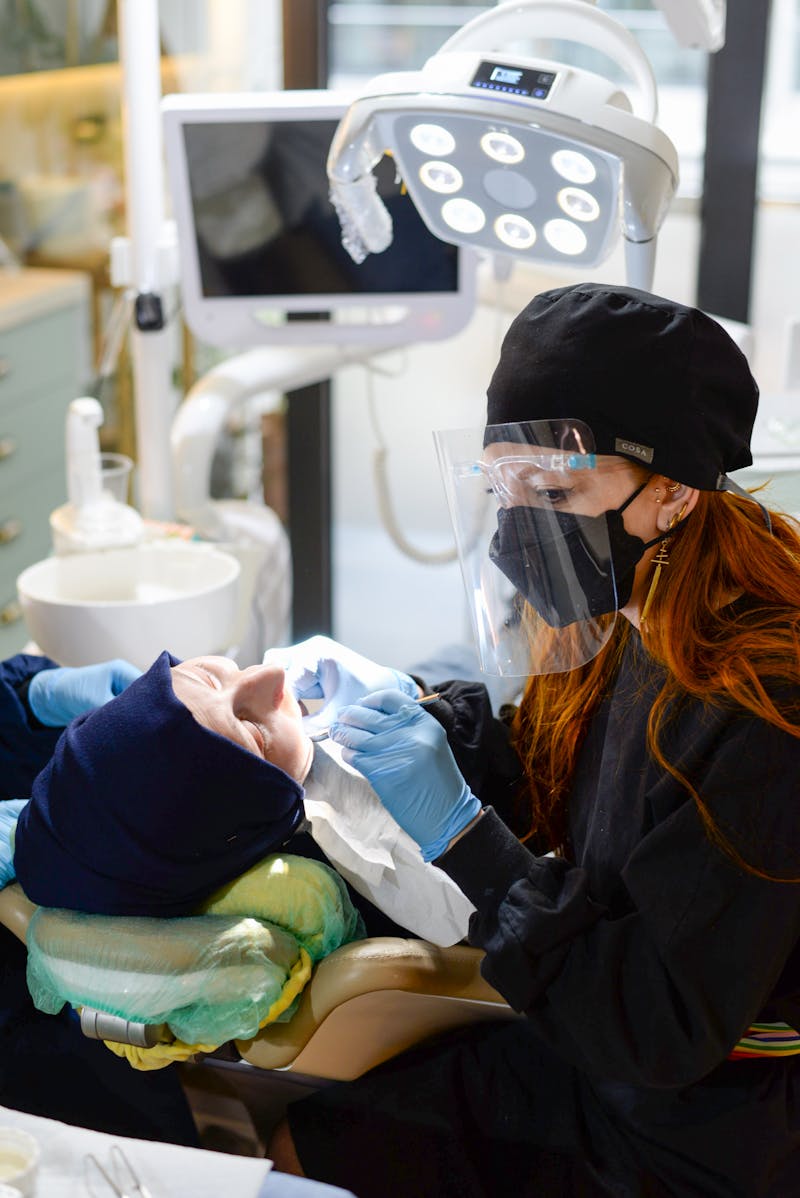 Dentist examining a patient