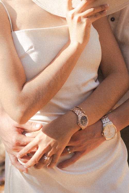 Free Close-up of a Woman in a White Dress and Man Embracing  Stock Photo