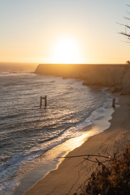 Sunset Sunlight over Cliff on Sea Coast