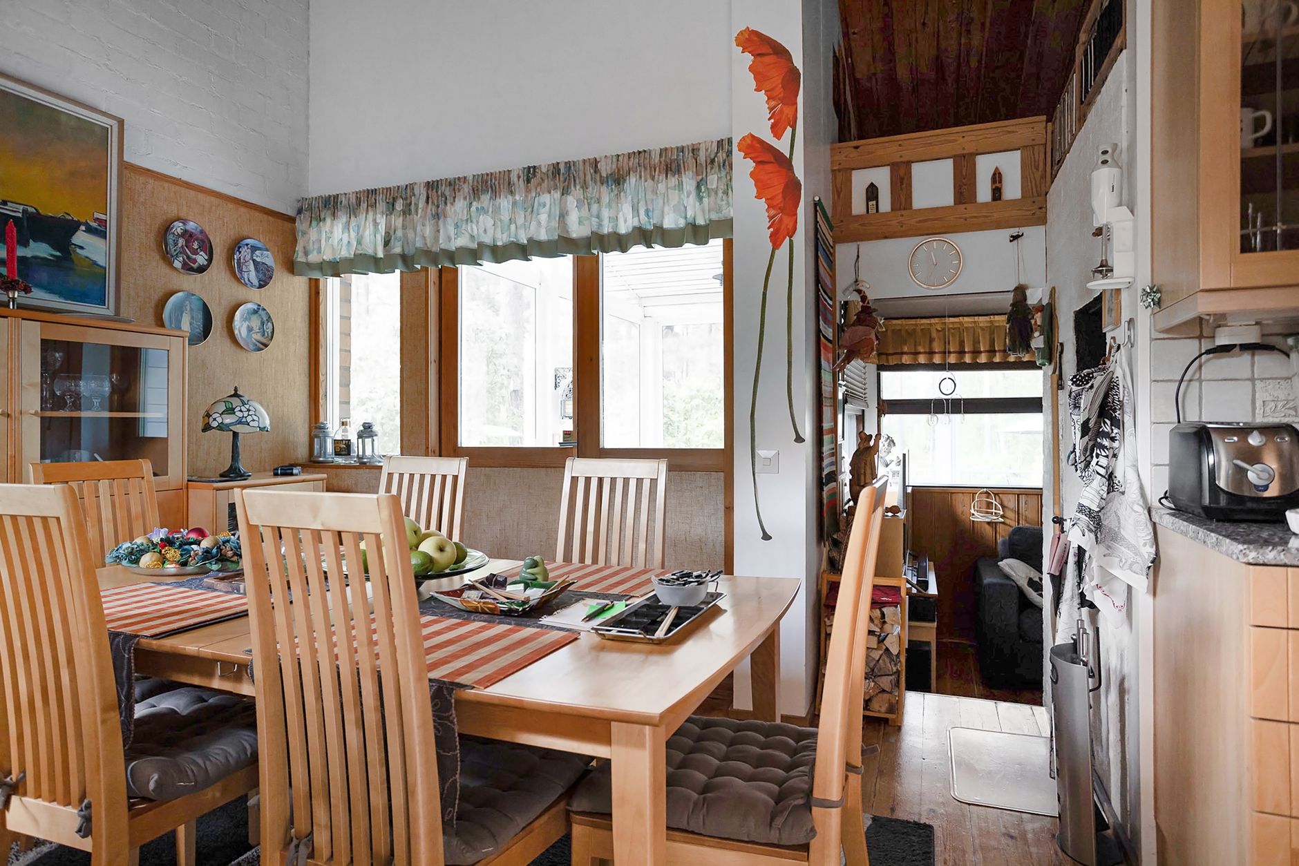 single wide mobile home interior decorating Warm and inviting dining room featuring wooden furniture and artistic decor elements.