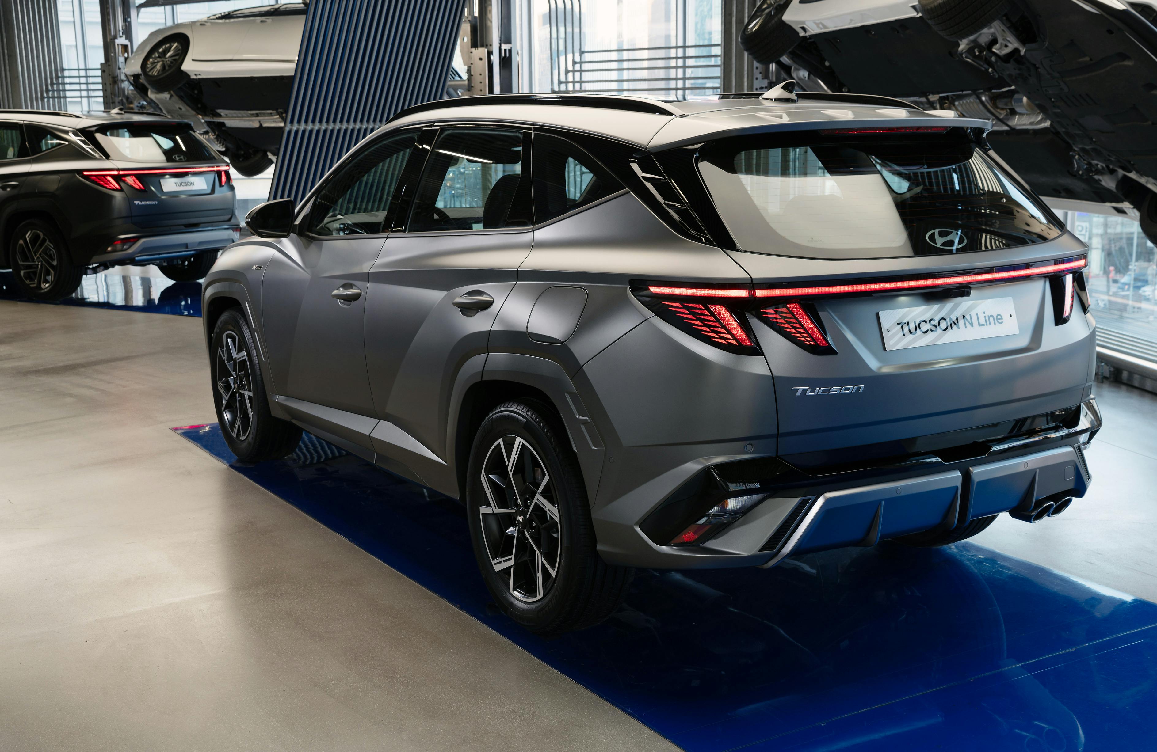 Automotive exhibition booth with modular design and sleek white background