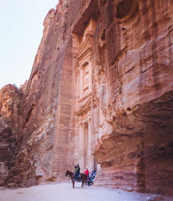 Explore Petra's iconic Al-Khazneh, a stunning ancient treasuries carved into sandstone cliffs.