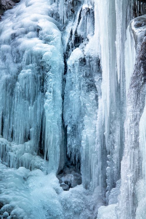 Free A stunning frozen waterfall captured in Vipiteno, Italy, showcasing winter beauty. Stock Photo