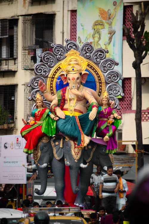 Free Vibrant statue of Lord Ganesha at a street festival in India during Ganesh Chaturthi. Stock Photo