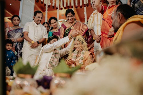 Free A bride and groom are getting married in a traditional indian ceremony Stock Photo