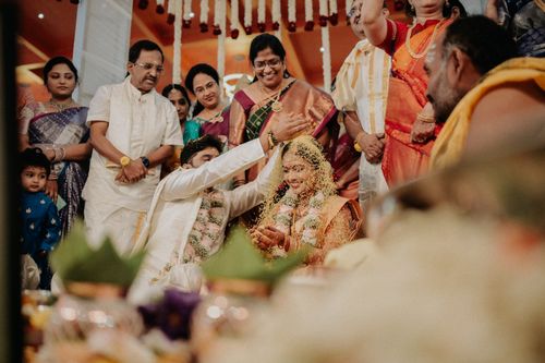 Free A vibrant Indian wedding ceremony with family and traditional rituals. Stock Photo