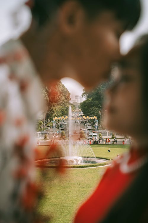 Fountain Behind Kissing Couple