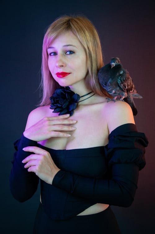 Portrait of Blonde Woman with Pigeon