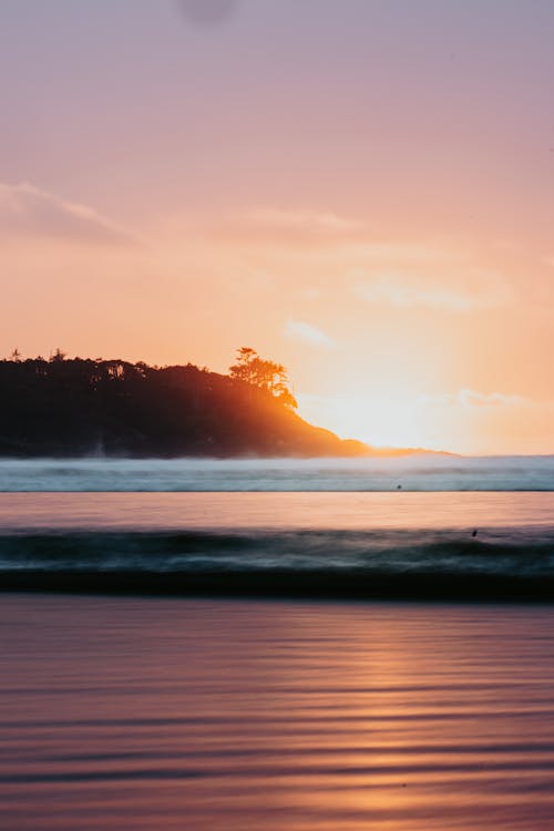 Foto profissional grátis de à beira-mar, alvorecer, beira-mar