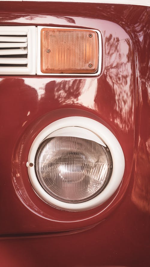 Close-up of the Headlight in a Red, Vintage Car