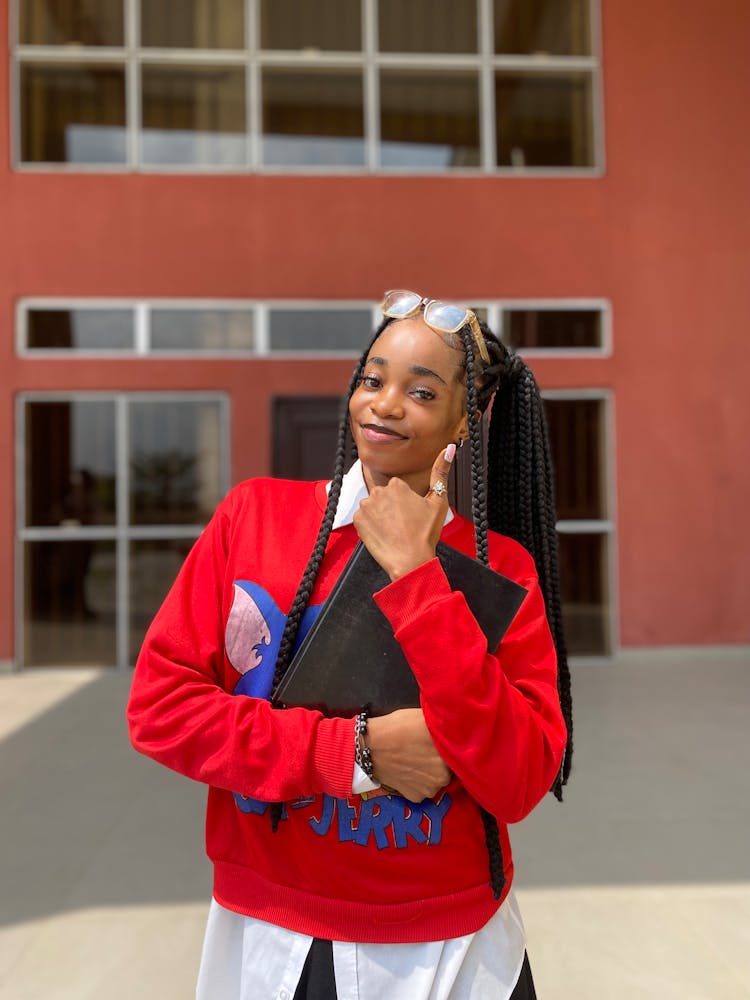 Portrait Of Smiling Teenager Student