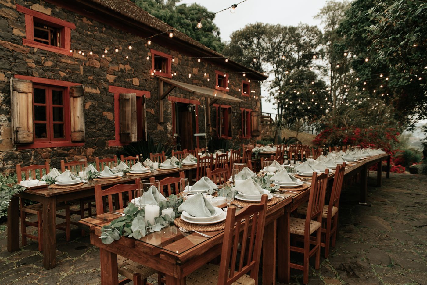 Long tables laid under the eaves