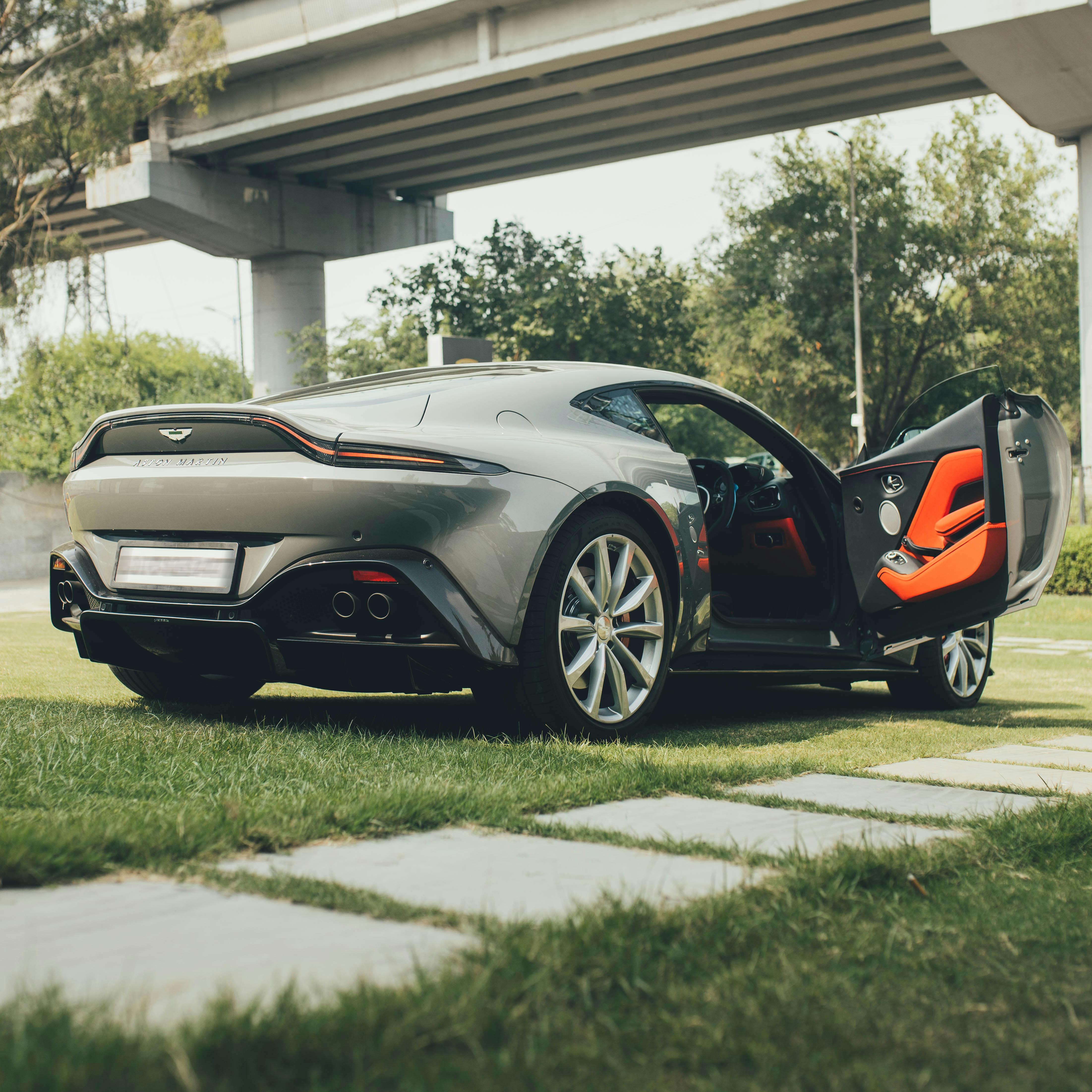 back view of silver aston martin vantage