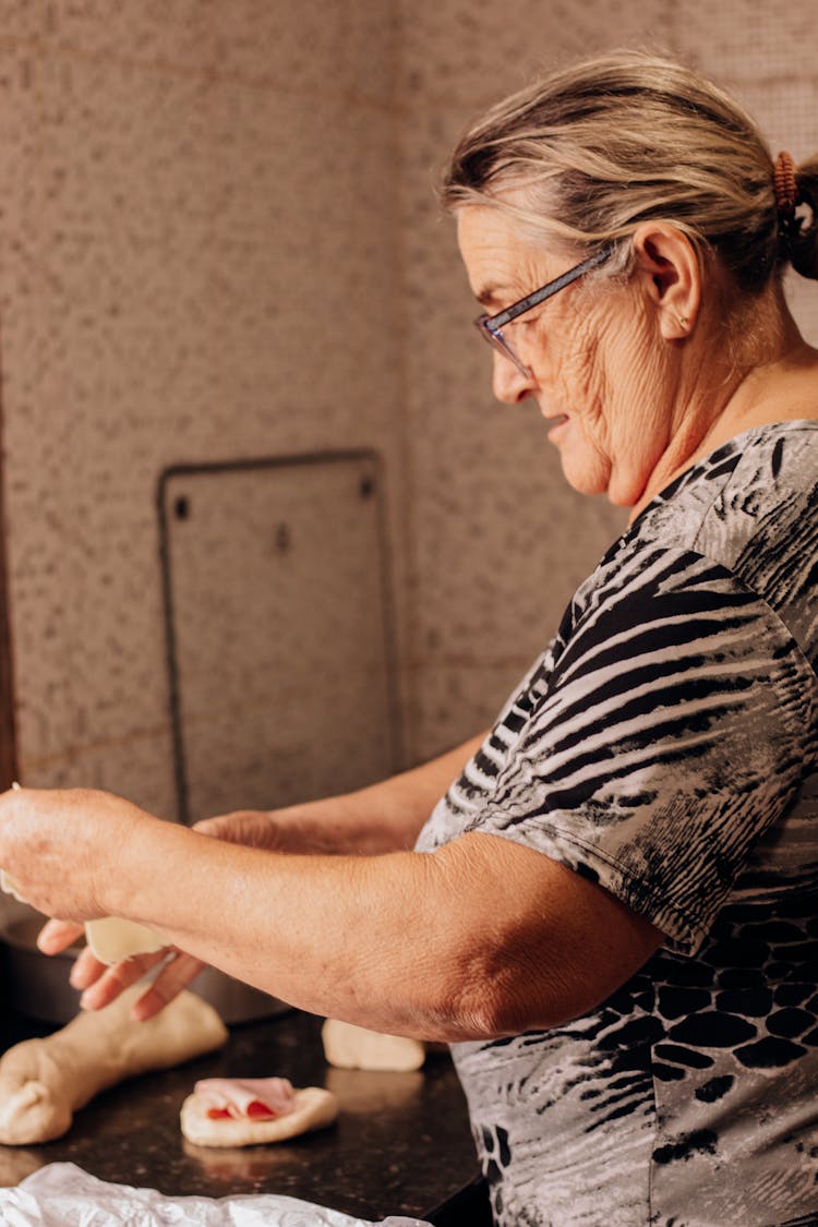 Elderly Woman Baking