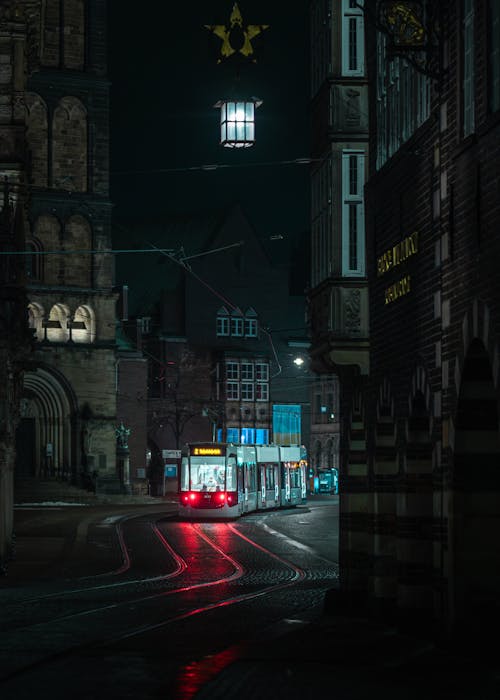 Tram on Street at Night