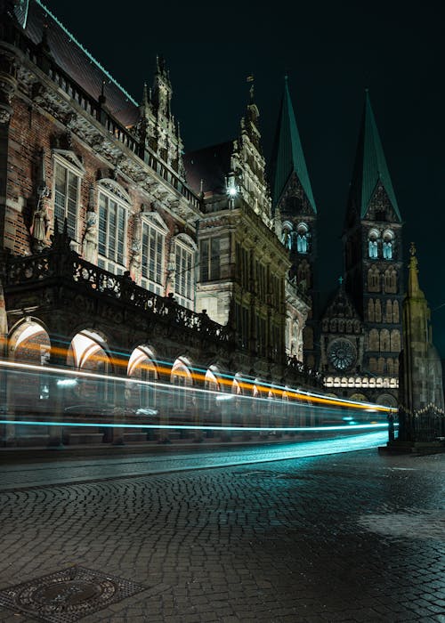 Lights over Gothic Buildings and Towers at Night