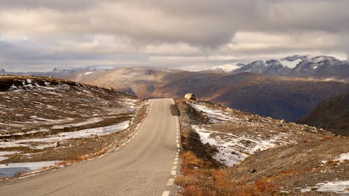 Narrow road through the Aurland highland in Norway during late autumn