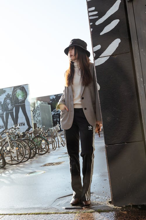 Woman on a Street in Front of Bicycles 