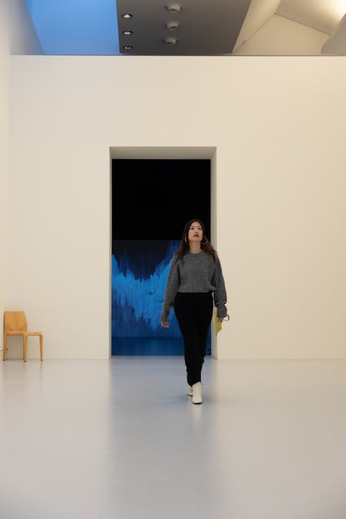 Brunette Woman in an Art Gallery 