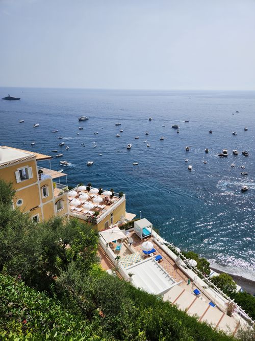 Free A stunning view of Positano's cliffside homes overlooking the vibrant Mediterranean Sea. Perfect for travel inspiration. Stock Photo