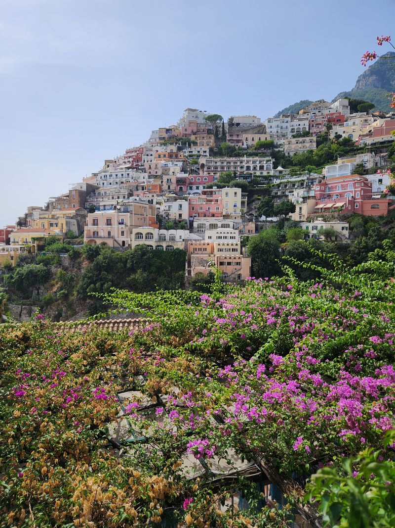 Pastel houses of Positano cascading down to the Amalfi Coast sea