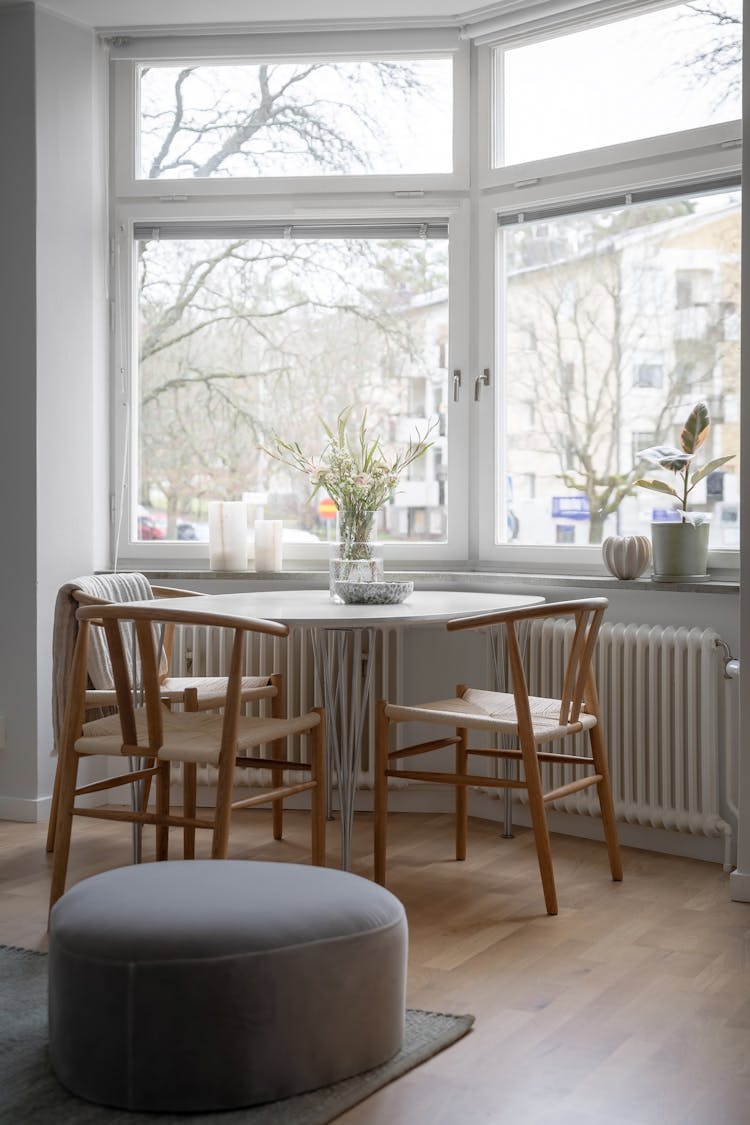 Wooden Table And Chairs In A Living Room 