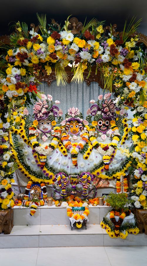 Beautiful Hindu Altar with Figures and Flowers