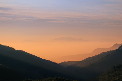 Hazy Sunrise in Mountains