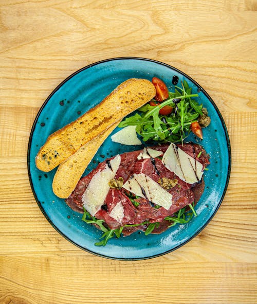 Bread, Meat and Salad on Blue Plate