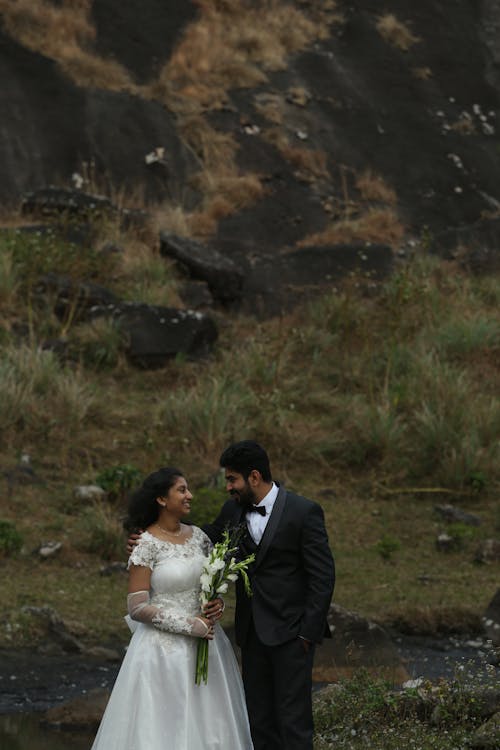 Happy Bride and Groom Posing Together