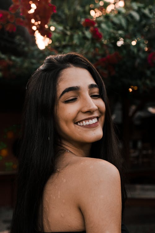 Close-Up Photo Of Woman Smiling