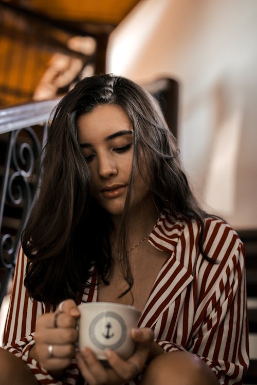 Free Woman Holding Teacup Stock Photo