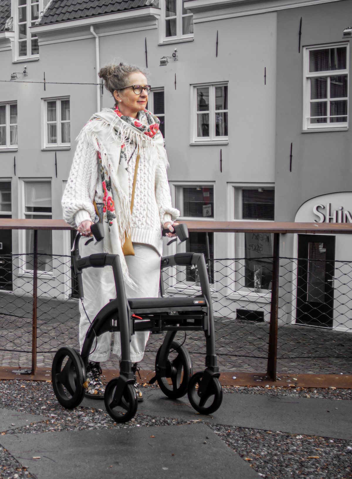 Older adult using a mobility aid to move more safely and confidently