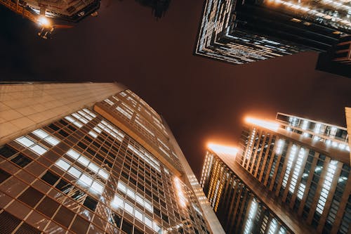 A view of tall buildings at night